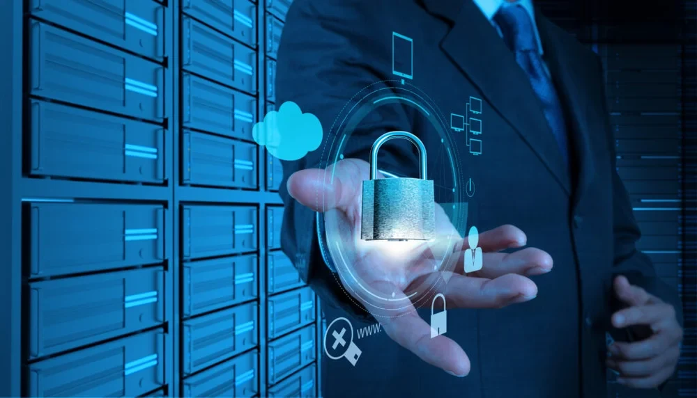 businessman hand showing 3d padlock on touch screen computer as Internet security online business concept