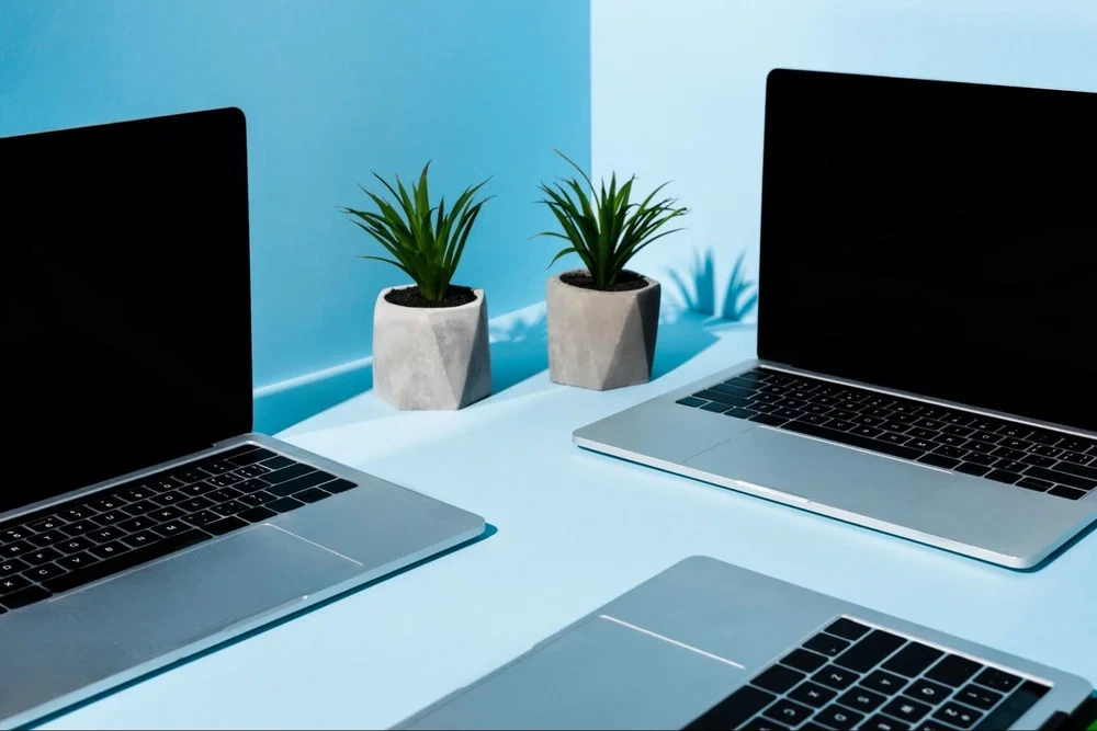 minimalistic setup of laptops