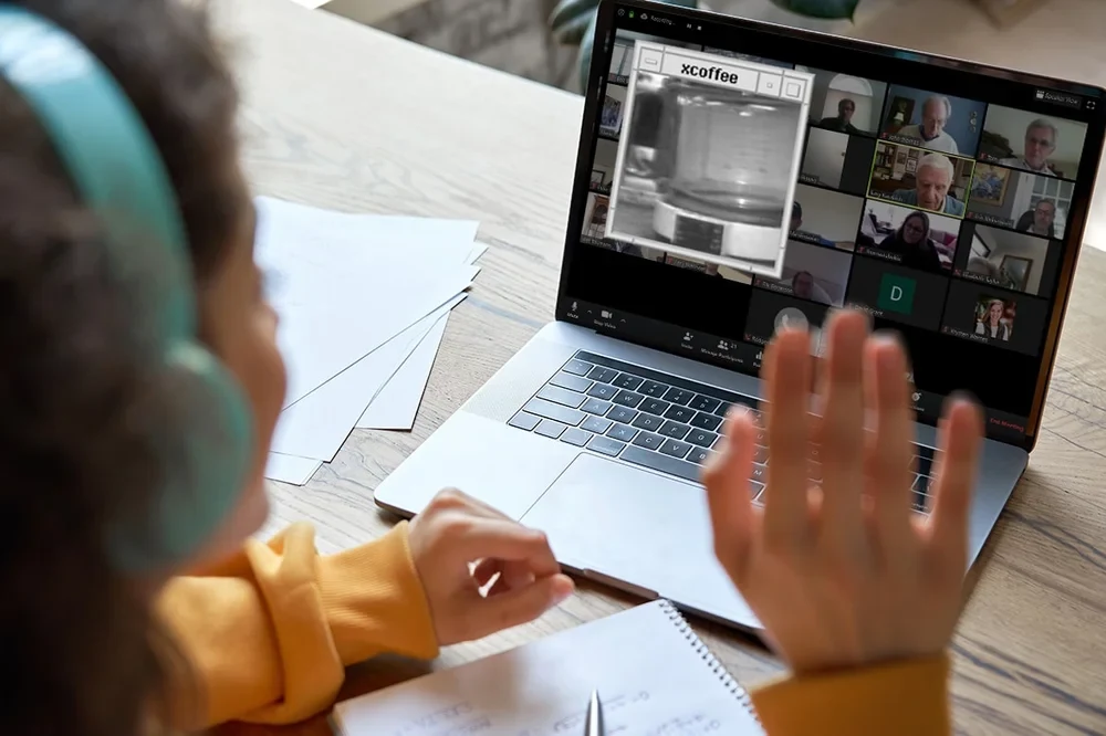 Woman on a zoom call on a laptop
