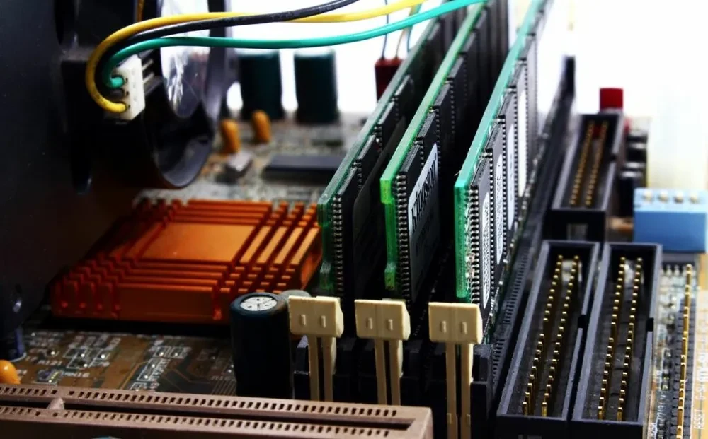 checking RAM to make sure it's seated correctly in the motherboard.
