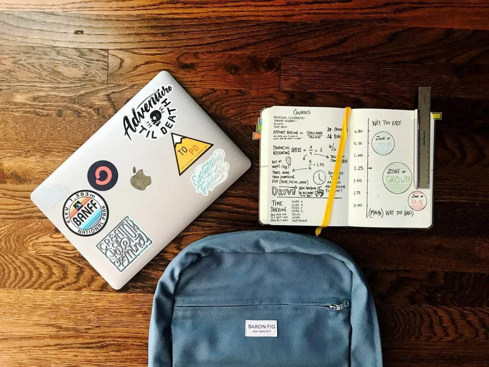 Backpack, laptop and notepad. Essentials